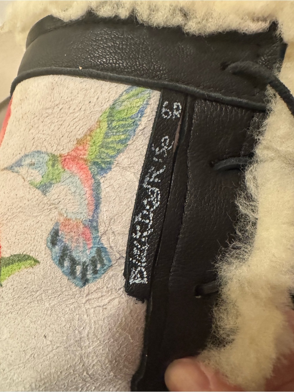 Muk Luks Women's Black and Cream Moccasin Slippers with Multicolor Bird Print